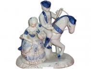 FIGURA CABALLO  CON SE�ORA PORCELANA 22x20x12 