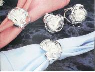 PORTA SERVILLETAS 4cm 4 Unidades FORMA DE ROSA
 COLOR PLATEADO                                                                                                                                                                                                                                                 